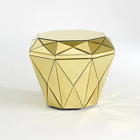 barbiecore trend gold gem shaped mirrored pouffe table