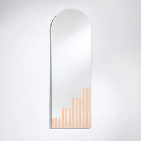 frameless arched long barbiecore style mirror with peach pink line print in corner