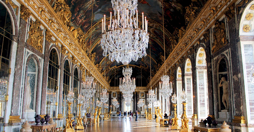 baroque style building interior at palace of versailles - hallway of mirrors
