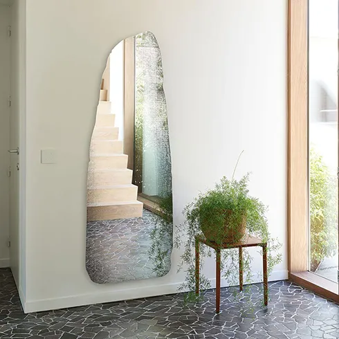 biomorphic mirrors to compliment biophilic design - tall rock shaped frameless mirror with printed texture design
