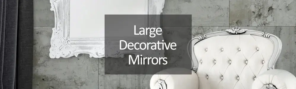 Large Decorative Mirrors - white ornate framed mirror on wall with white armchair infront