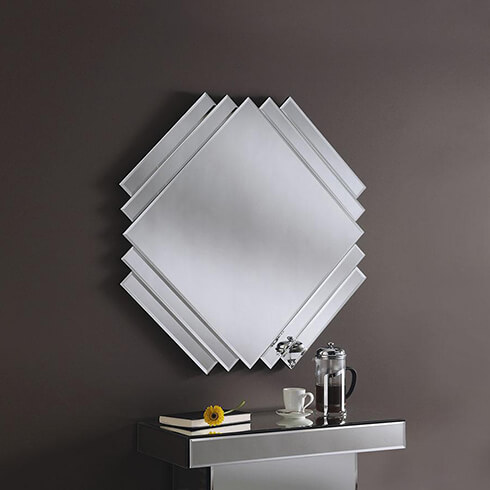  square stepped mirror in art deco style on brown wall